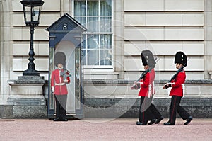 LONDON - AUGUST 8, 2015: Changing of the guard in Buckingham Palace.
