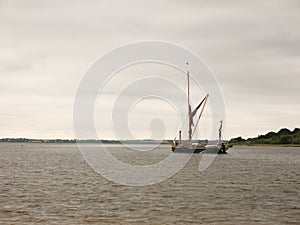 A London Barge Sailing down the River Colne into open Sea