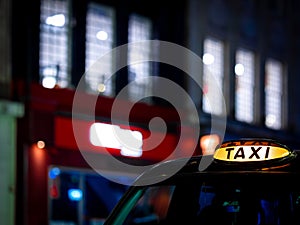 London black cab in the night in the center of the city