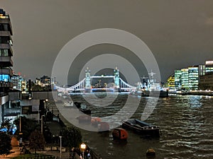 London bridge at night. Tamesis river and modern buildings in London, Great Britain,UK