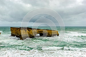 London Bridge on a stormy day, Great Ocean Road, Victoria, Australia