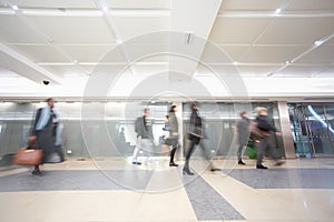 London businessman train tube station in rush hour