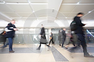 London businessman train tube station in rush hour