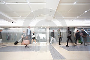 London businessman train tube station in rush hour