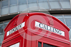 London calling symbol red phone box on business ce