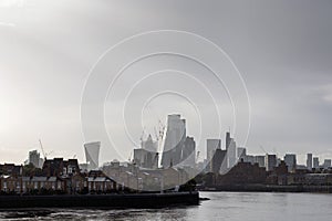 London dockland housing and modern business buildings in the background