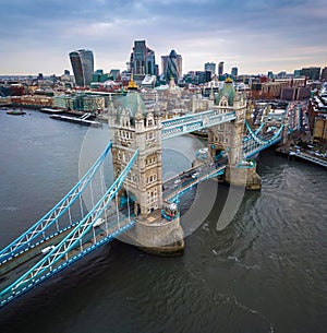 London, England - Aerial panormaic view of the iconic Tower Bridge and Tower of London on a cloudy moring photo