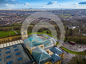 London, England - Aerial skyline view of north London with red double decker bus, taken from Alexandra Park