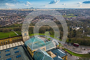 London, England - Aerial skyline view of north London with red doulbe decker bus, taken from Alexandra Park