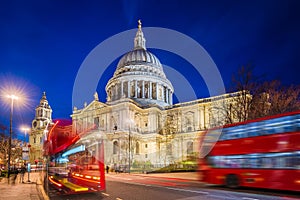 London, England - Beautiful Saint Pauls Cathedral with iconic red double decker buses