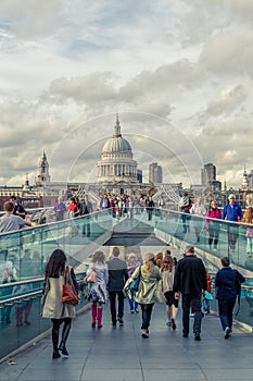City of London, Millennium bridge and St. Pauls cathedral in su