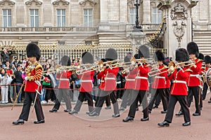 LONDON, ENGLAND - JUNE 17 2016: British Royal guards perform the Changing of the Guard in Buckingham Palace, London, Grea