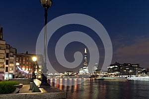 LONDON, ENGLAND - JUNE 17 2016: Night Panorama of Southwark Bridge, The Shard skyscraper and Thames River, London