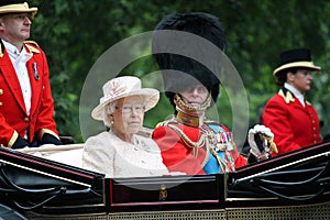 Queen Elizabeth II in an open carriage with Prince Philip for trooping the colour 2015 to mark th