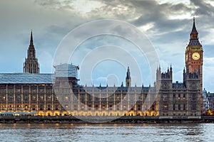 LONDON, ENGLAND - JUNE 16 2016: Sunset view of Houses of Parliament, Westminster palace, London, England