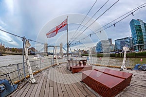 View from one ship with British flag on Thames river