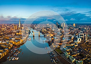 London, England - Panoramic aerial skyline view of London including Tower Bridge with red double-decker bus