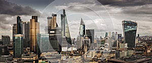 London, England - Panoramic skyline view of Bank and Canary Wharf, central London`s leading financial districts photo