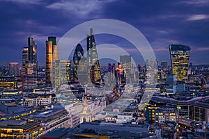 London, England - Panoramic skyline view of Bank district of London with the skyscrapers of Canary Wharf