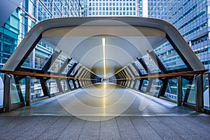 London, England - Public pedestrian cross rail footbridge at the financial district of Canary Wharf