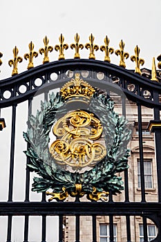 LONDON, ENGLAND Royal coat of arms of the United Kingdom on the Buckingham palace gate