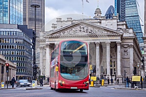 London, England - The Royal Exchange building with moving double decker bus