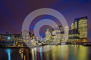 London, England - The skyscrapers of Canary Wharf financial district and residential buildings