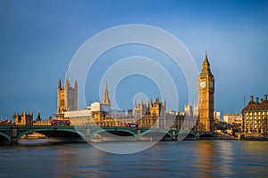 London, England - Traditional red double decker buses on Westminster Bridge with Big Ben