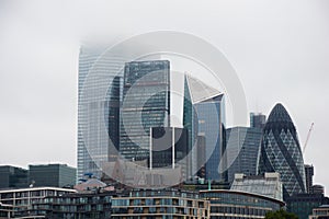 LONDON, ENGLAND/UNITES KINGDOM â€“â€“  Skyscrapers of city of London from another bank of River Thames