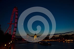 London Eye and Big Ben in the Central London within sunset time.