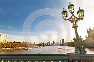 The London Eye on the South Bank of the River Thames at night in London, England