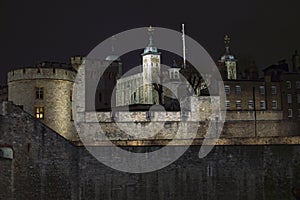 The london fort tower at night with lights