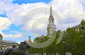 London, Great Britain -May 23, 2016: Lion statue on Trafalgar Square at Nelsonâ€™s Column
