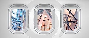 London modern buildings as seen through three aircraft windows. Holiday and travel concept