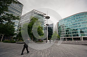 london modern office block with office worker