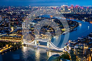 London at night with urban architectures and Tower Bridge