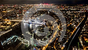 London at night with urban architectures and Tower Bridge