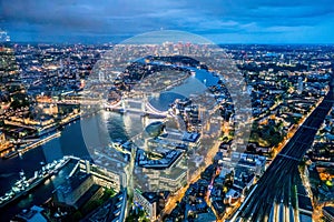 London at night with urban architectures and Tower Bridge