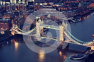 London at night with urban architectures and Tower Bridge