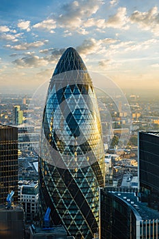 LONDON - OCTOBER 1: Gherkin building (30 St Mary Axe) during sunrise in London on October 1, 2015