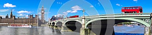 London panorama with red buses on bridge against Big Ben in England, UK
