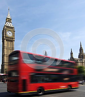 London red bus passing Big Ben