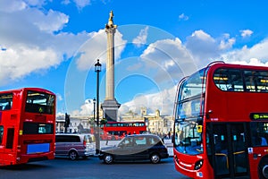 London Red buses in front of Trafalgar Square - London