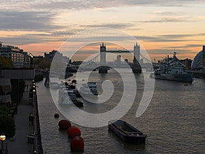 London`s cityscape at dusk: Tower Bridge, River Thames, etc.