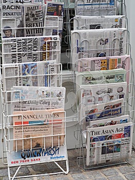 LONDON - SEP 2019: International newspapers stand