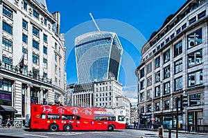 A London sightseeing double-decker bus on King William St in the City of London