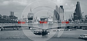 London skyline with red buses photo