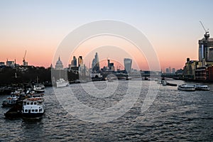 London skyline shot at dusk, of the River Thames and the skline