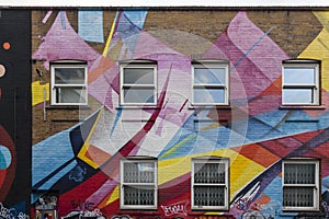 Streetart and graffiti on  a wall in London