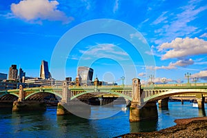 London Southwark bridge in Thames river photo